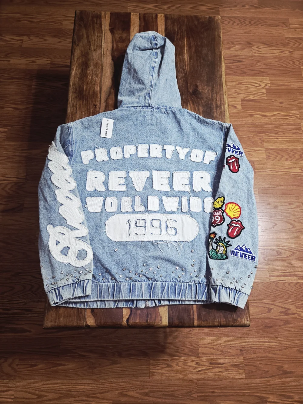 Reever Jeans Men's Denim Jacket W/ Light Blue Wash And Full Patchwork. Size XL.